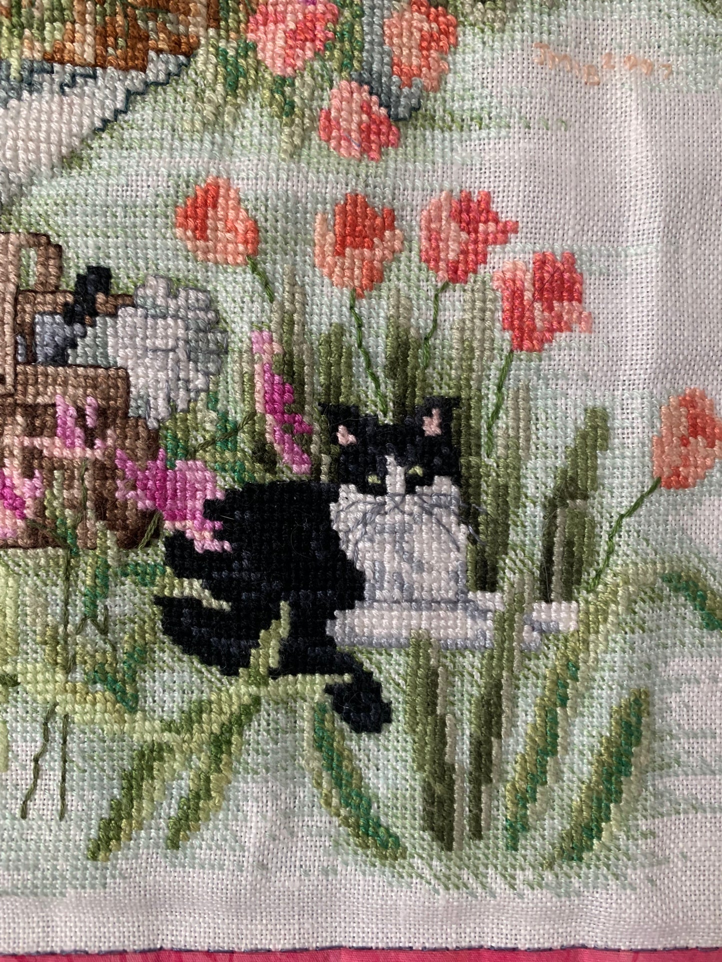handmade cross stitch garden hanging