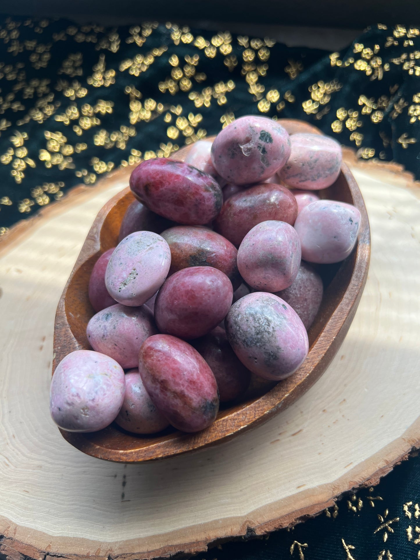 pink rhodonite tumbles