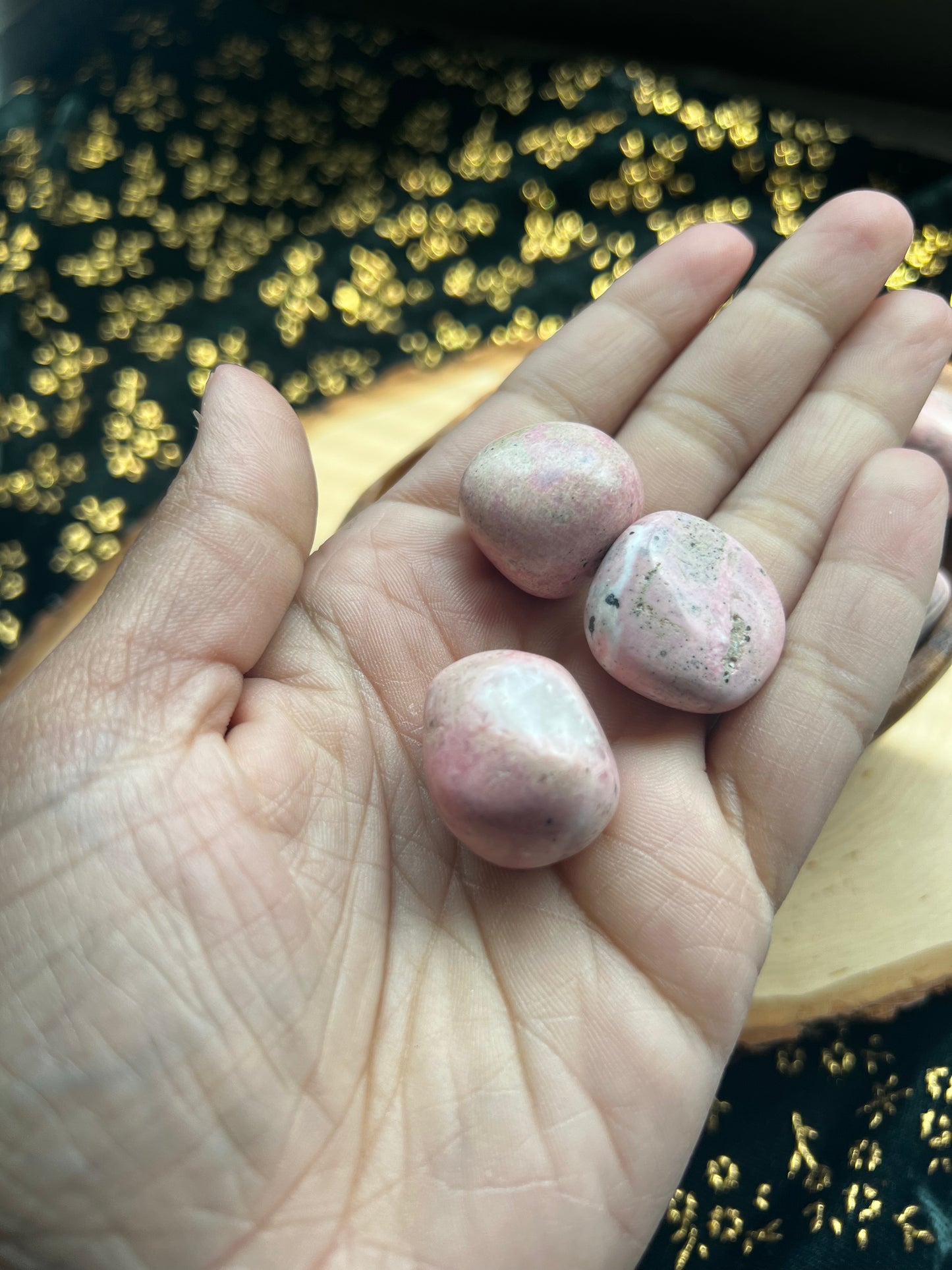 pink rhodonite tumbles