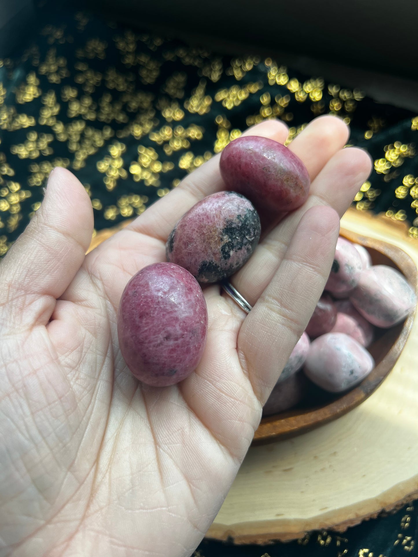 pink rhodonite tumbles