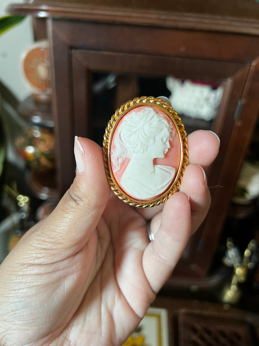 coral/pink cameo brooch