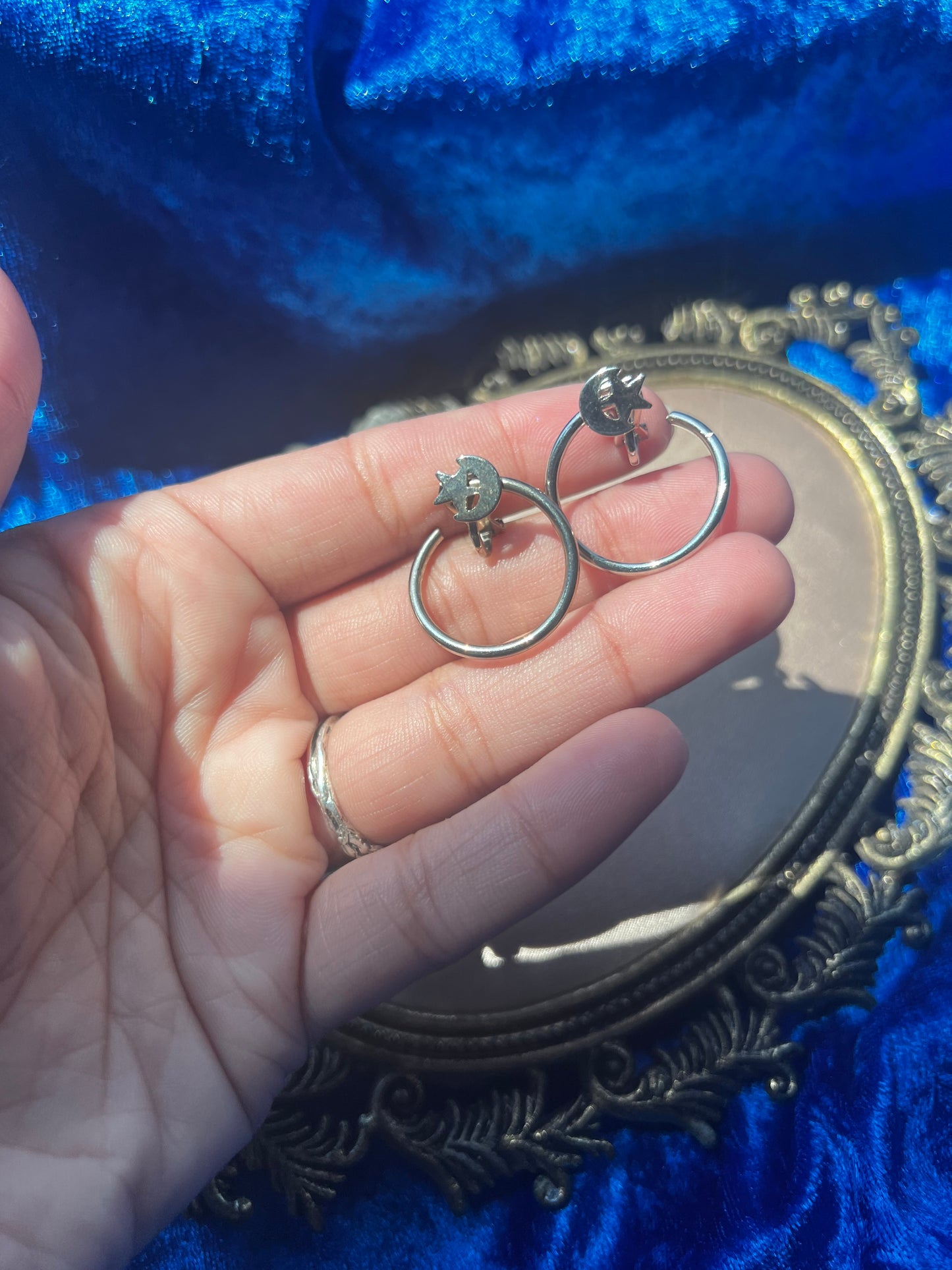 Silver Toned Moon and Star Clip on Earrings