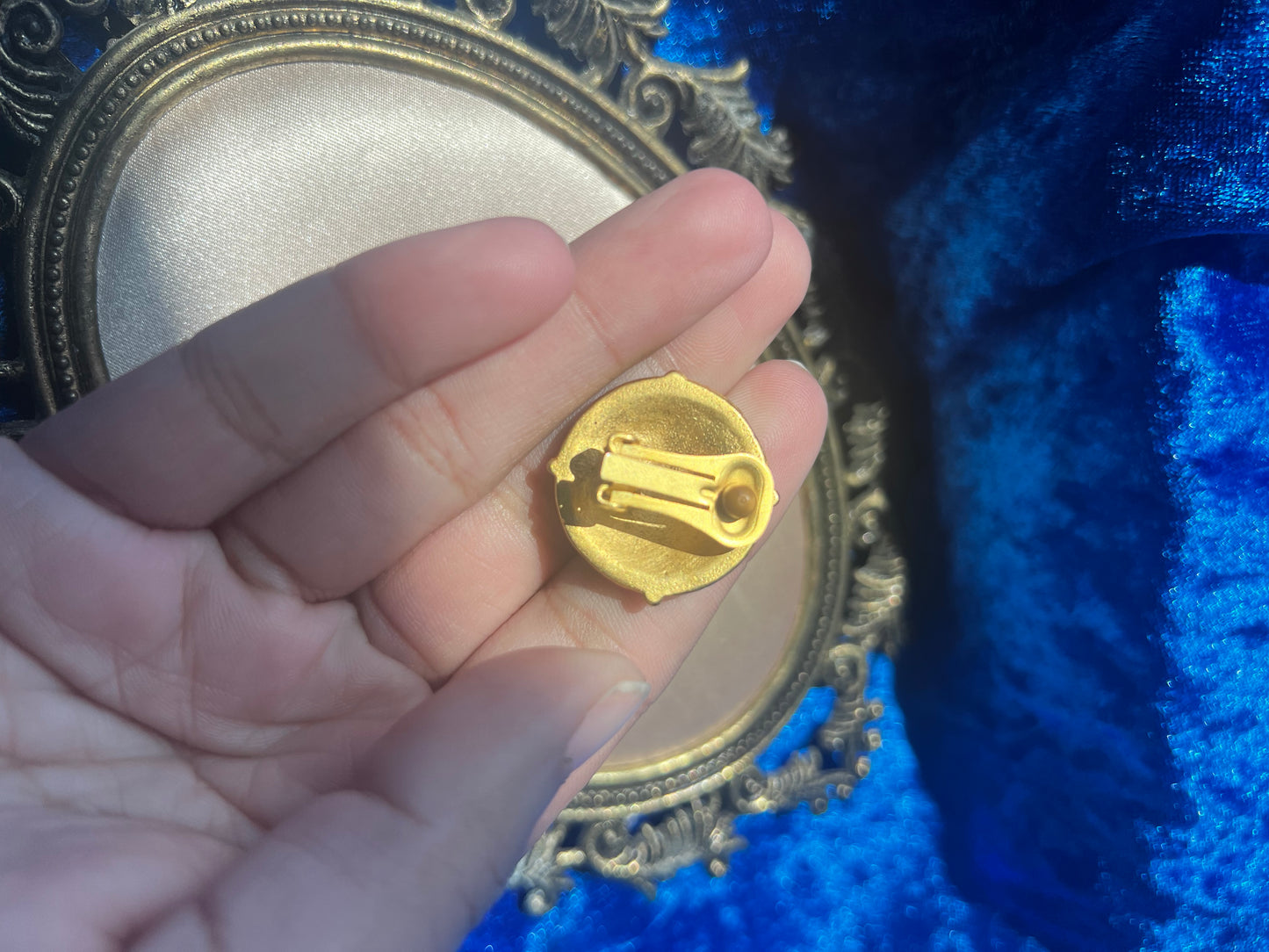 Blue and Gold Toned Sun Clip on Earrings