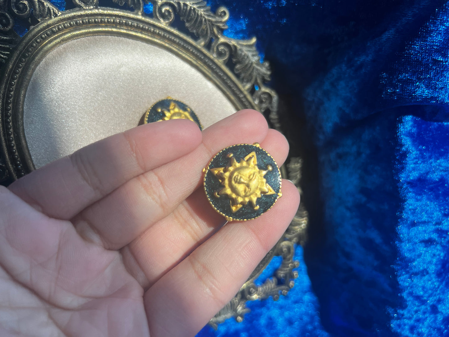 Blue and Gold Toned Sun Clip on Earrings