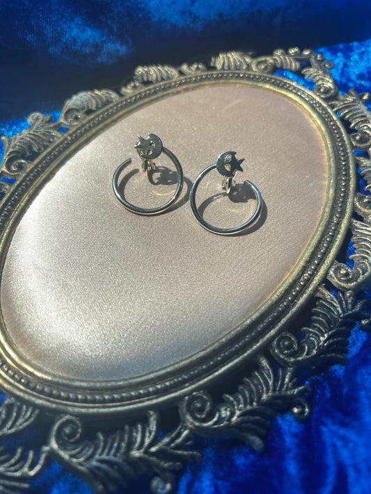 Silver Toned Moon and Star Clip on Earrings