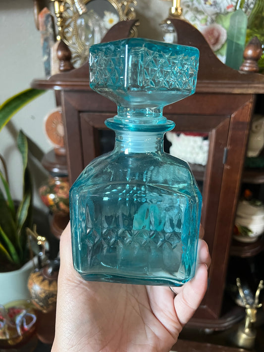 short blue glass decanter