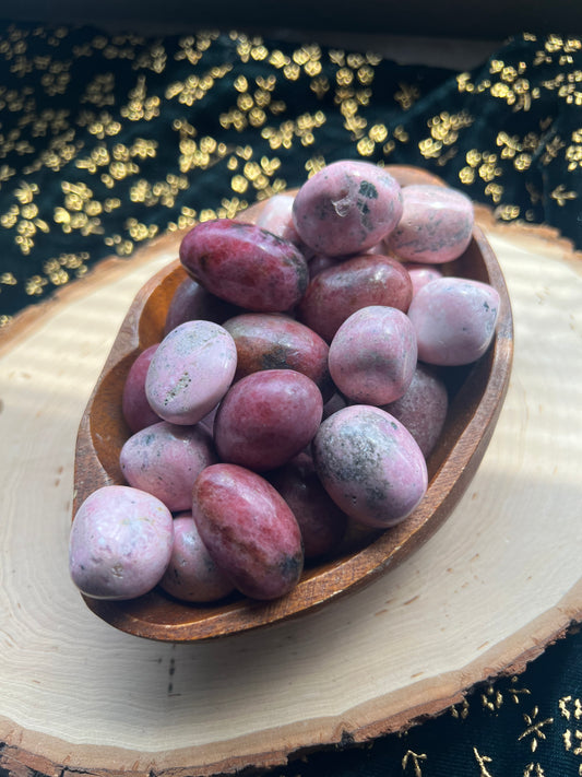 pink rhodonite tumbles